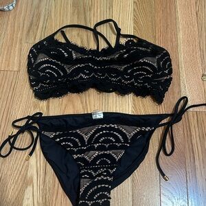 Woman’s PQ swim suit size medium